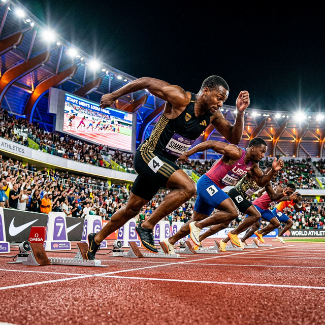 Sprinters bursting out of starting blocks